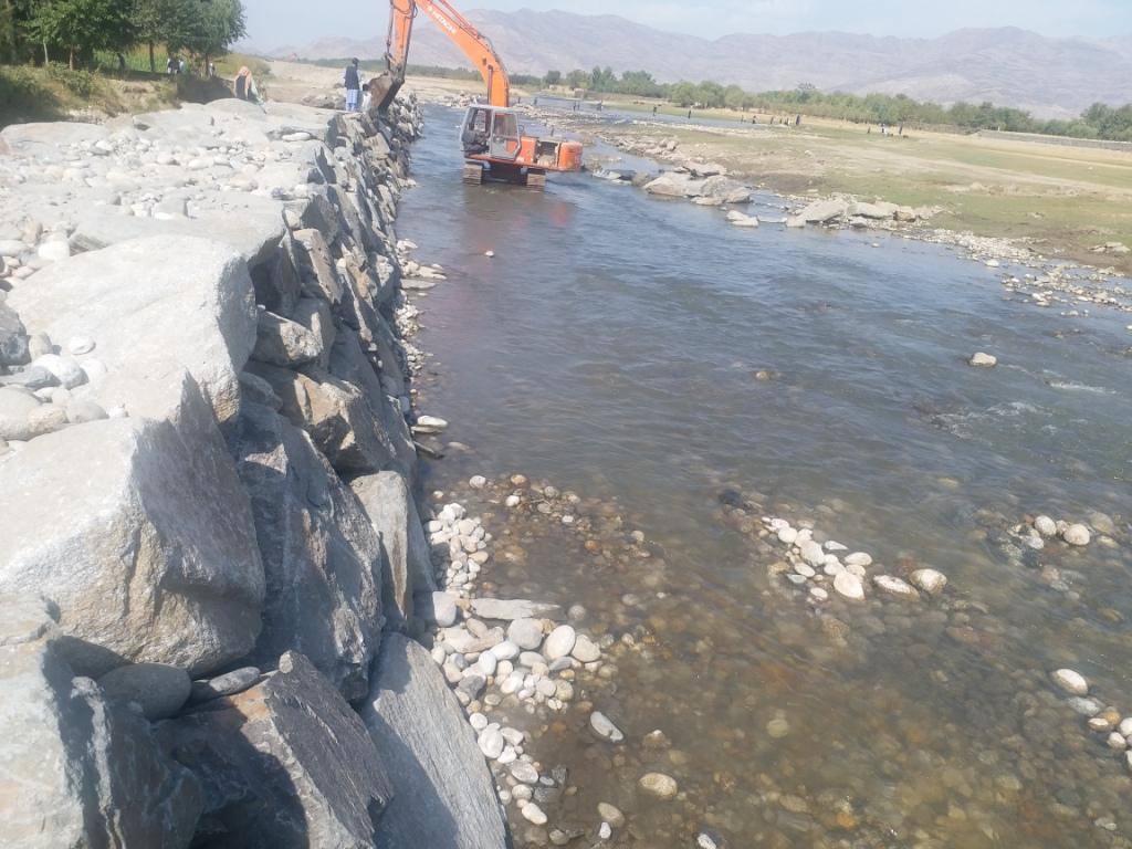 Work progress of a 374 – meter protective boulder wall construction project in Laghman province 