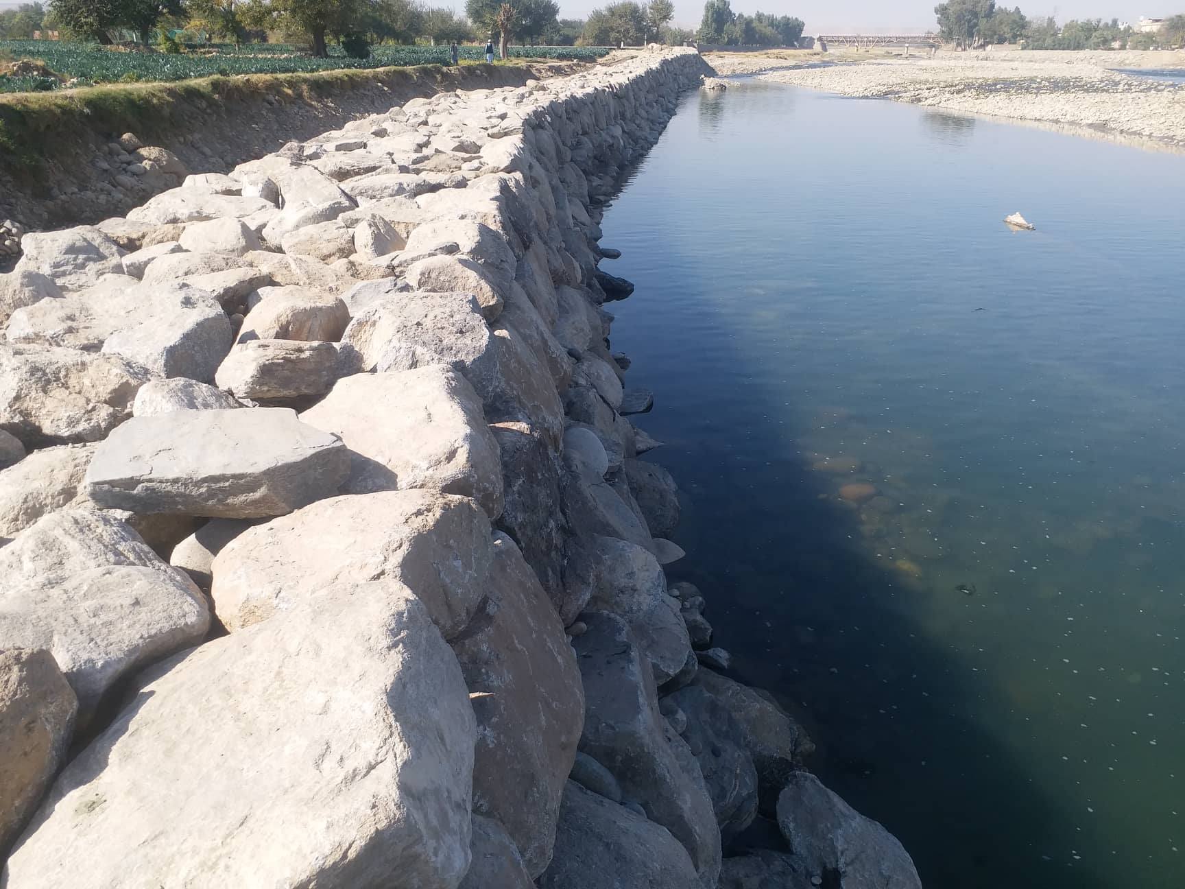 Work progress of a 755- meter boulder wall construction project in Laghman province
